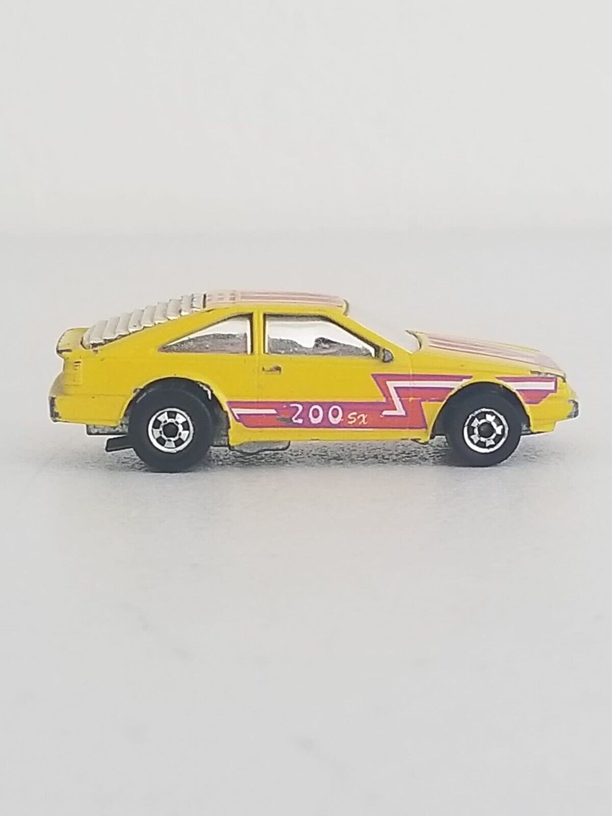 Vintage 1986 Hot Wheels Flip Outs Nissan 200SX Flippin’ Frenzy Yellow Collectible - TreasuTiques