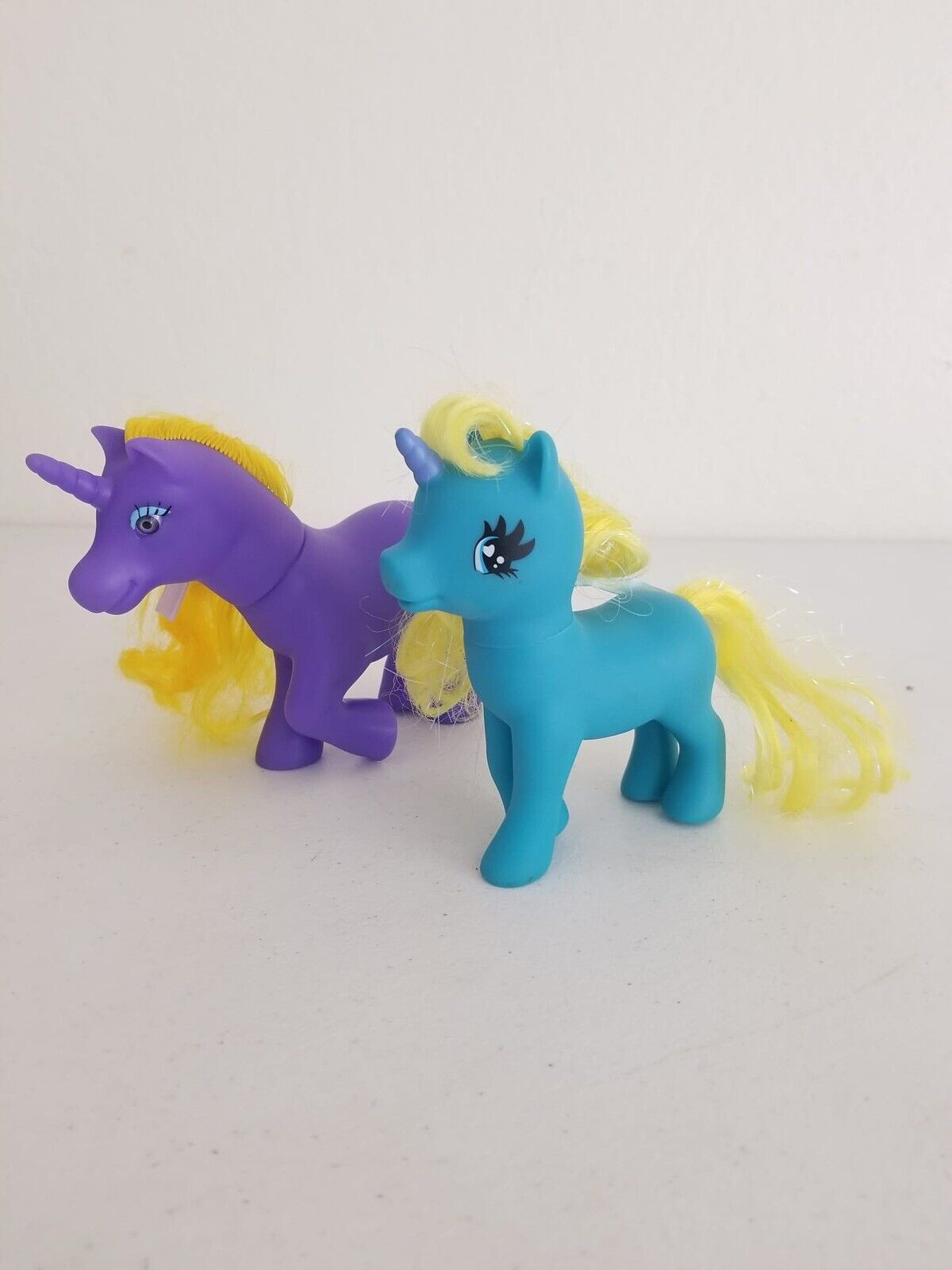 Charming Vintage Gi-Go Fakie Wonder Pony Land Unicorns - Purple with Sun Emblem & Blue with Yellow Mane - TreasuTiques