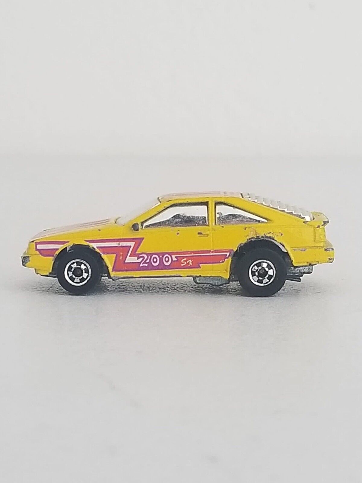 Vintage 1986 Hot Wheels Flip Outs Nissan 200SX Flippin’ Frenzy Yellow Collectible - TreasuTiques