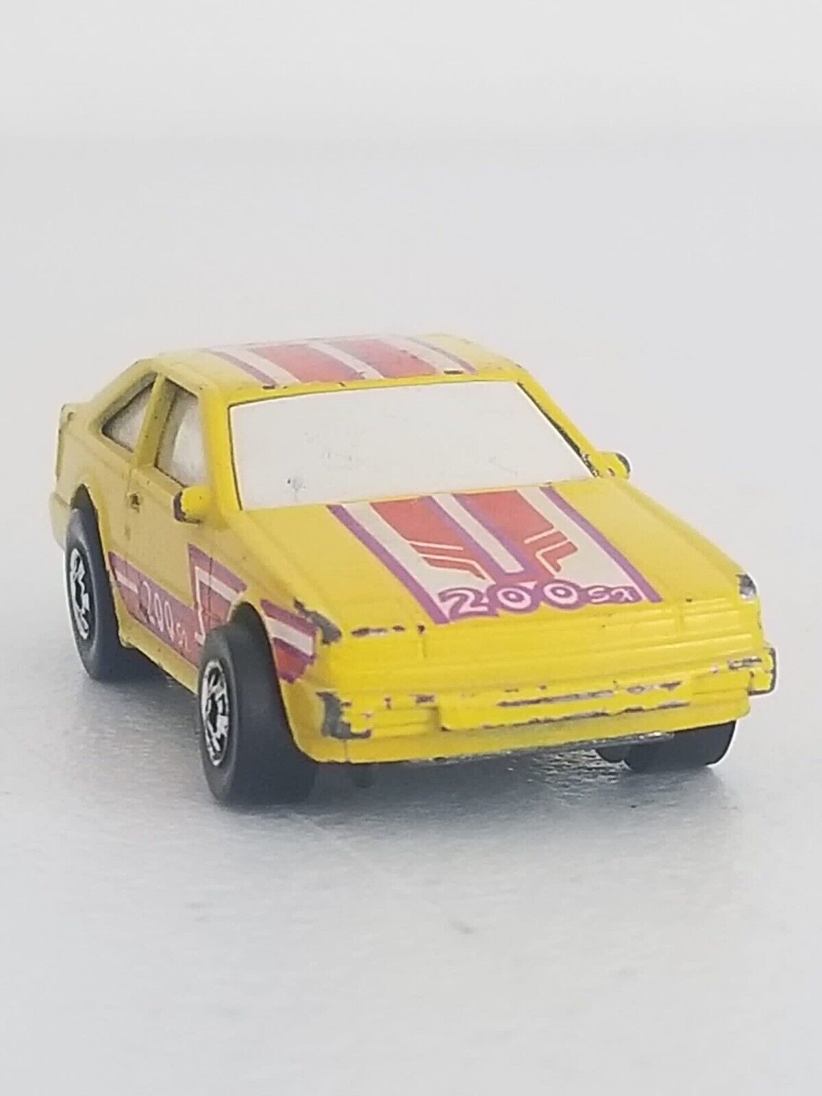 Vintage 1986 Hot Wheels Flip Outs Nissan 200SX Flippin’ Frenzy Yellow Collectible - TreasuTiques