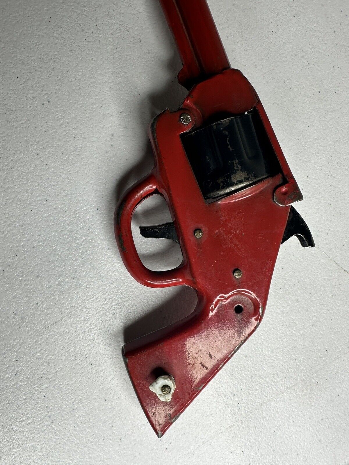 Vintage 1940s Wyandotte Pressed Steel Clicker Toy Gun with Skull and Crossbones Holster - 9.5 Inch Collectible - TreasuTiques