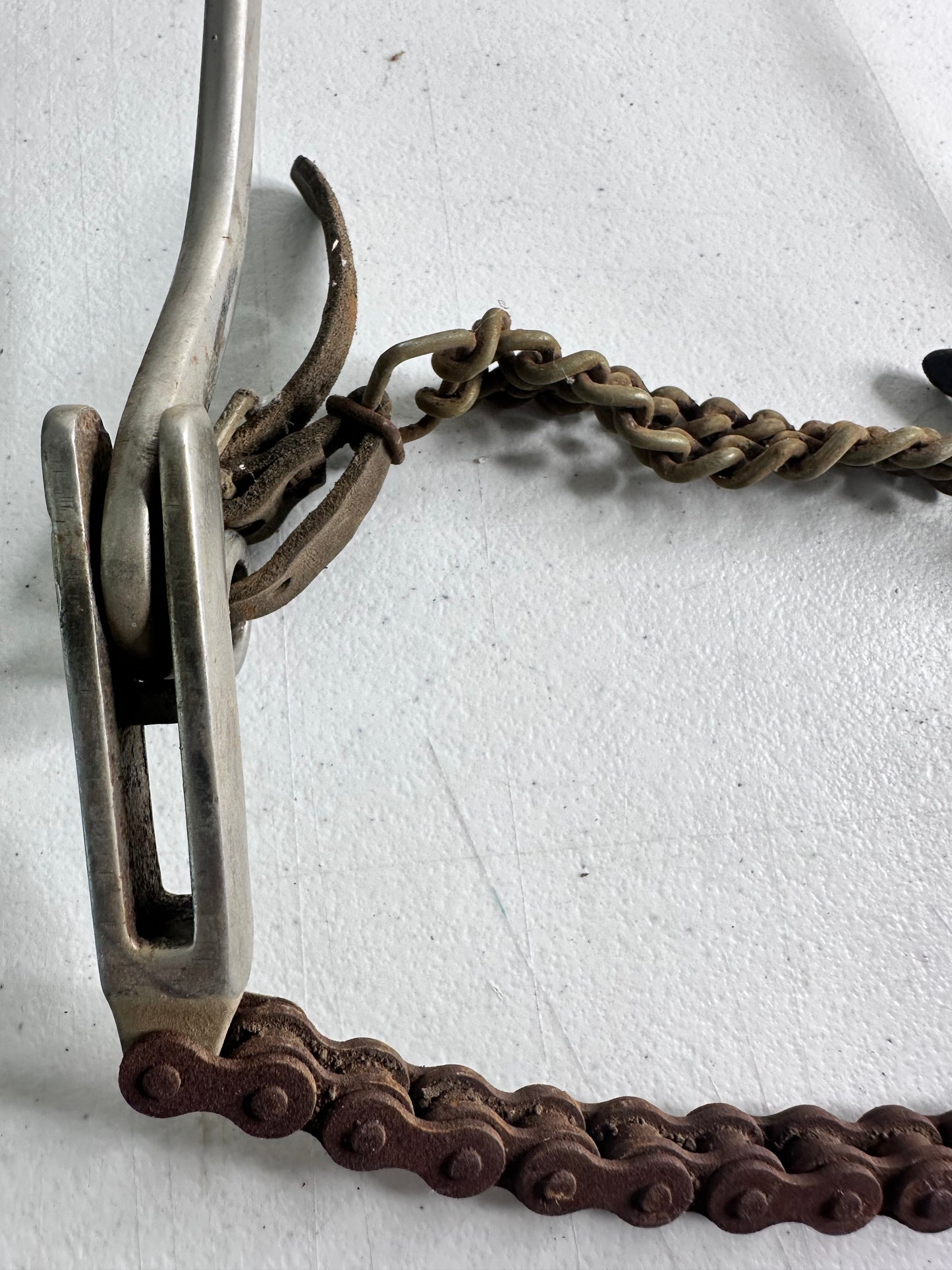 Vintage Spade Bit Horse Bit with Rusty Chain and Worn Leather Straps - Collectible