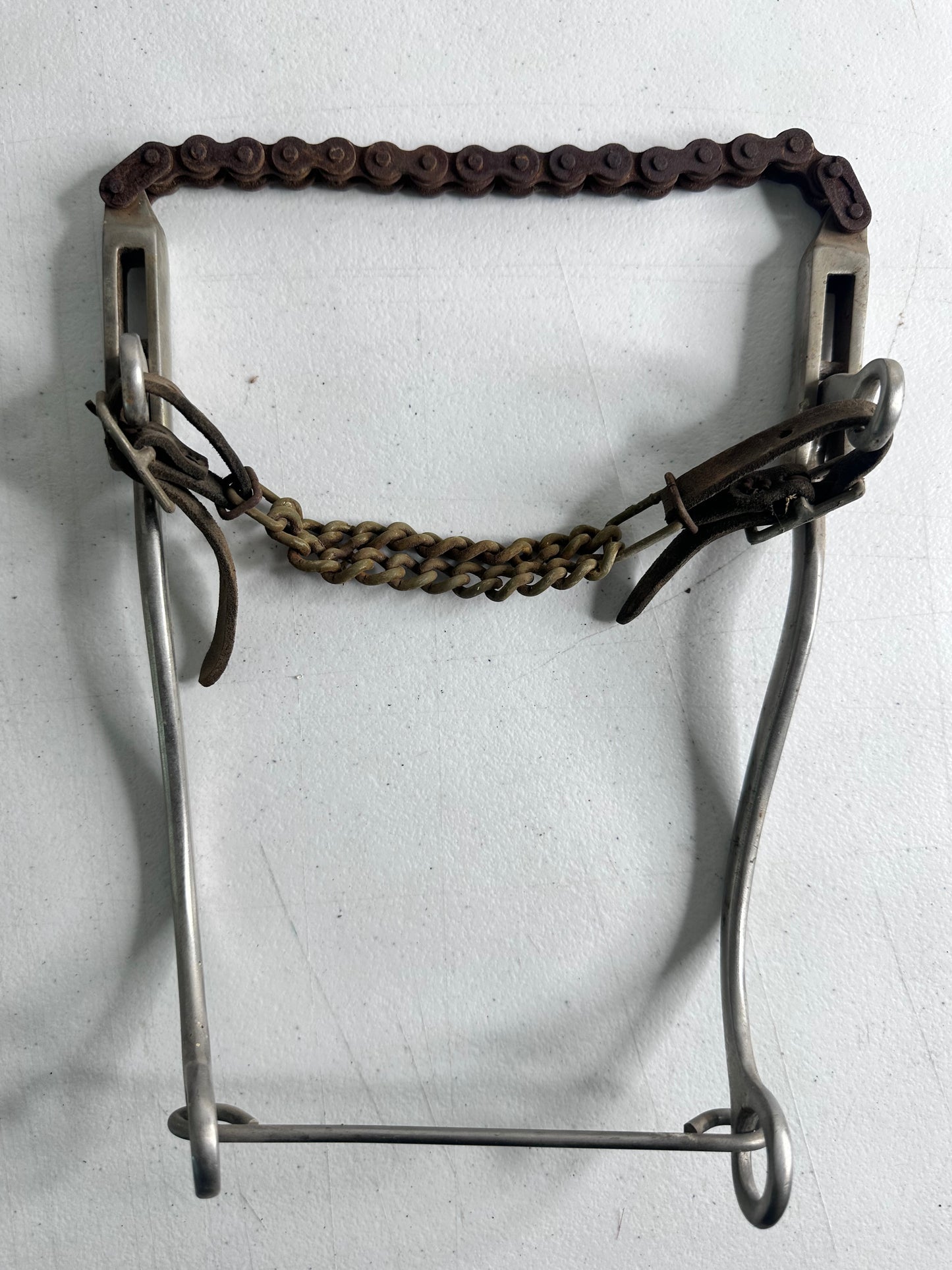 Vintage Spade Bit Horse Bit with Rusty Chain and Worn Leather Straps - Collectible